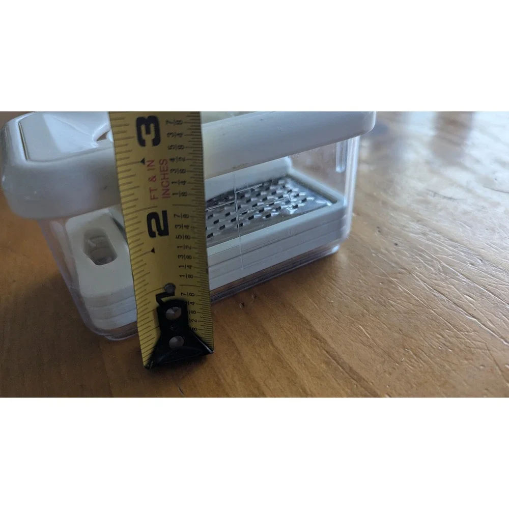 Compact 4-in-1 Kitchen Grater Slicer Set with Storage Container‎ White Clear